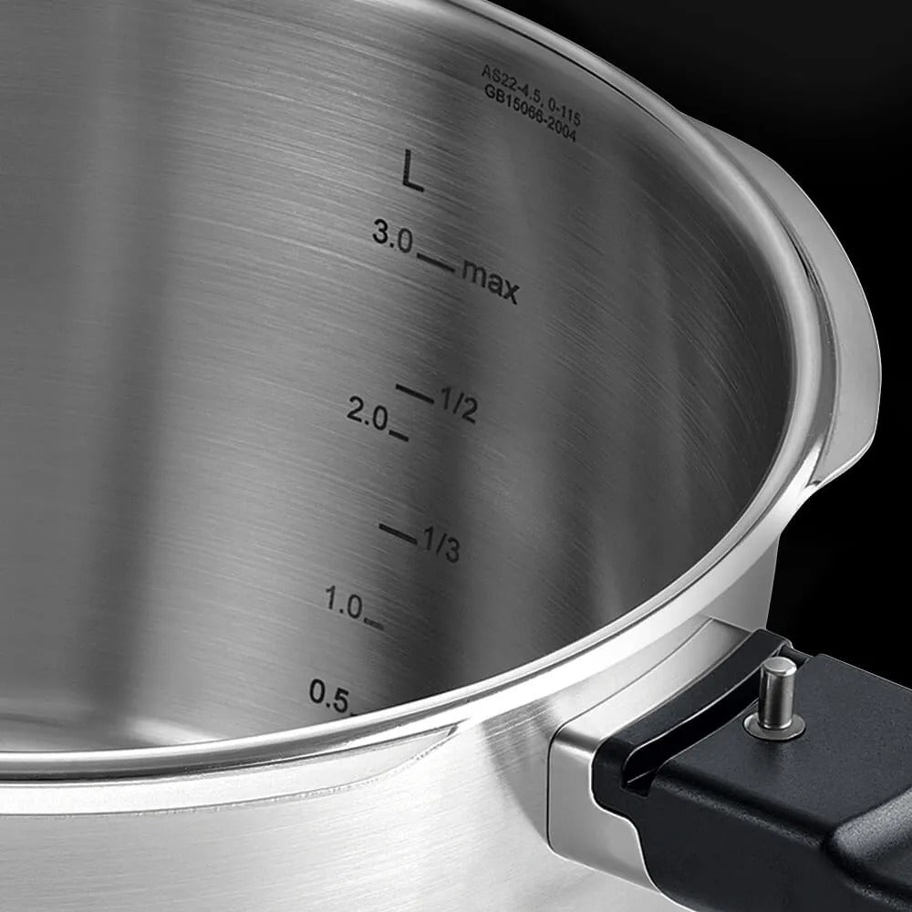 Stainless steel pot with measurement markings on the lid