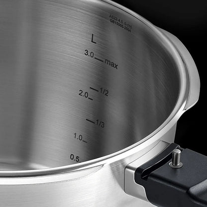 Stainless steel pot with measurement markings on the lid