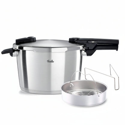 Stainless steel pressure cooker with steamer insert on a white background